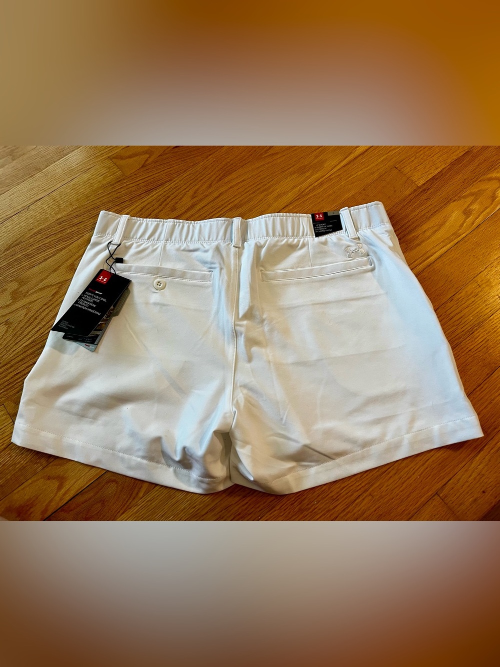 NWT- Under Armour White Performance Golf Shorts, 4” inseam, women’s size 12